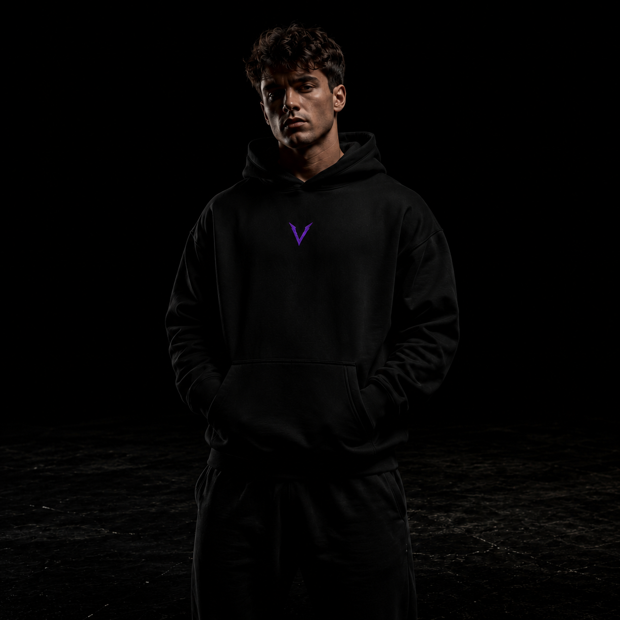 VIRTUS model wearing black hoodie